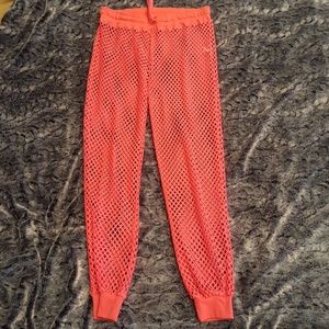 Dolls kill club exx neon mesh joggers